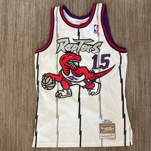 Worn once. Youth Toronto Raptors Vince Carter Mitchell